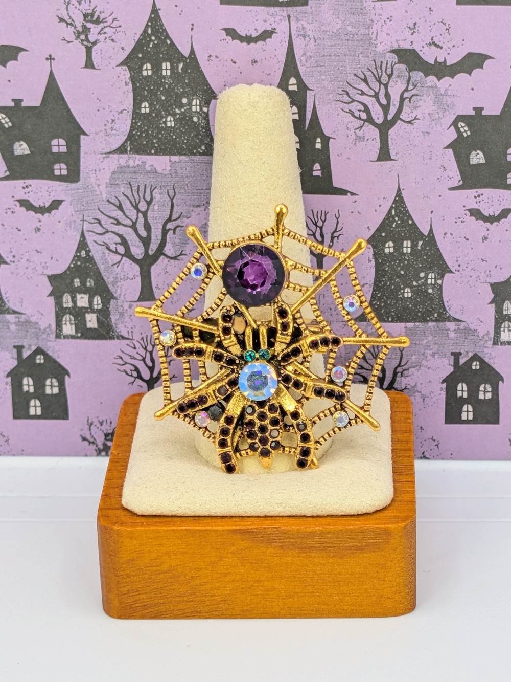Gold Tone Spider Web Brooch with Royal Purple Rhinestones